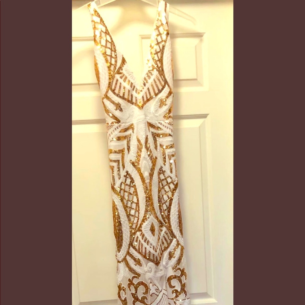 White and gold maxi gala dress.